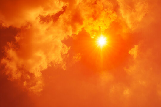 Extreme heat, intense sunlight, and scorching atmosphere representing heatwaves, global boiling, and climate change.