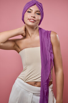 Young woman inspires hope through breast cancer awareness portrait