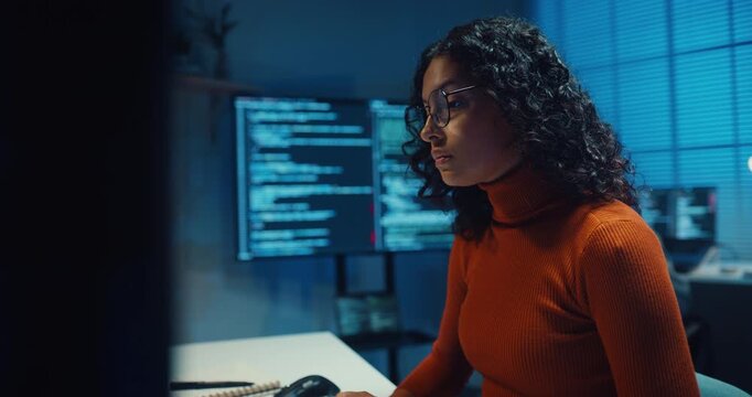 Group Adult male, female freelance typing write prompt AI bot IT app smart program nomad, video game, terminal with coding language, designer, big data center on desktop computer in office at night.