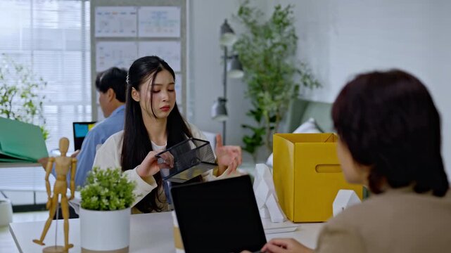 businesswoman packing into cardboard box due to job layoff,worker replaced by AI automation,career retirement,ai disruption and modern technology,Digital Disruption,Document Management Data System