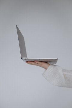 laptop in hand