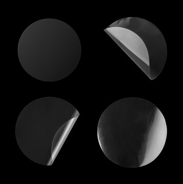 Transparent round adhesive sticker mockup set with peeling peeled edges isolated on black background with clipping path