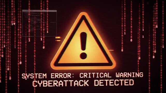 A digital screen displaying a critical warning message about a detected cyberattack with binary code background.