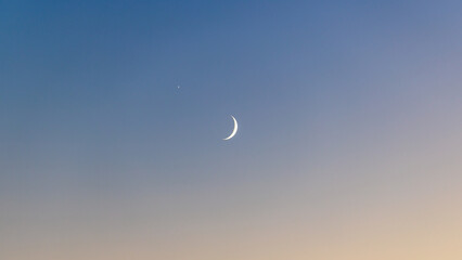 Soft Pastel Twilight Sky with Waxing Crescent Moon and Venus © CHO KEE HO