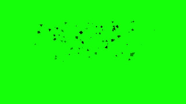 Black debris particles scattering on green screen background