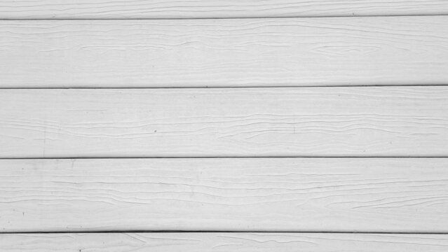 Horizontal white artificial wood texture background, clean planks wall surface, wood grain pattern, modern architectural material, space for text.