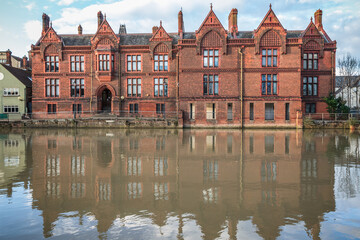 Fototapeta premium Facade of Shire Hall, currently serving as a civil court building, reflected in the River Great Ouse in Bedford, UK