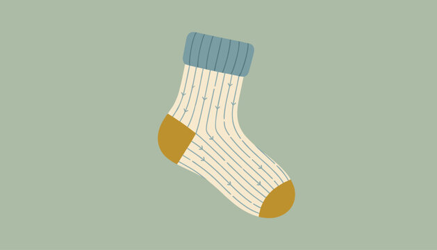 Cozy warm knitted winter sock with blue cuff and yellow heel details isolated on light olive green background.