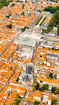 Vertical video. Nancy, France. Stanislav Square. Nancy City Hall. Nancy Cathedral. Summer, Sunny day. Drone footage, Point of interest. Rich colors