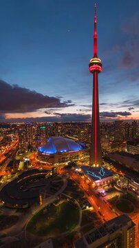 Day to night timelapse of Downtown Toronto in Ontario, Canada, zooming out. 