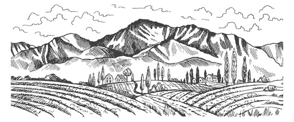Naklejka premium A mountain range with a small town in the valley