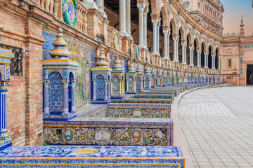 The tiled alcoves with benches in the Plaza de España (Spain Square), a plaza in Maria Luisa Park in Seville, Spain © I-Wei Huang