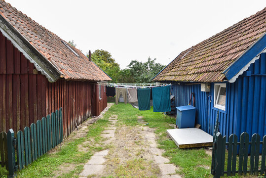 Traditional Wooden Houses With Laundry in the Coastal Town of Nida, Lithuania