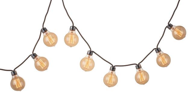 Edison string lights with amber glass bulbs and dark cords, isolated on transparent background