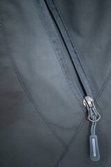 close up of zipper on a grey background © George