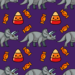 Seamless vector pattern with cute triceratops dinosaurs and Halloween candy corn on purple background © Khrystyna Turchyn