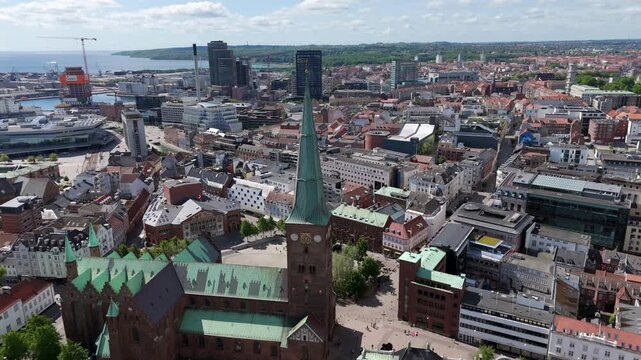 Aerial view of the historic Aarhus Cathedral and Aarhus cityscape on a sunny day, Denmark.	