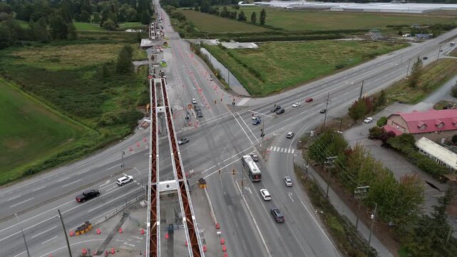 Infrastructure Staging And Launching Setup For The Surrey Langley Skytrain Project Over Pacific Highway In Surrey, British Columbia, Canada. - aerial shot