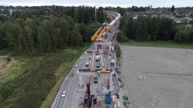 Aerial View Of Ongoing Construction Of An Elevated Guideway For The Surrey-Langley SkyTrain Extension Project In British Columbia, Canada.