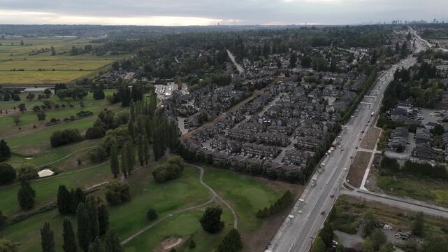 Fraser Highway, Residential Houses And Golf Course In Surrey, British Columbia, Canada. - aerial shot