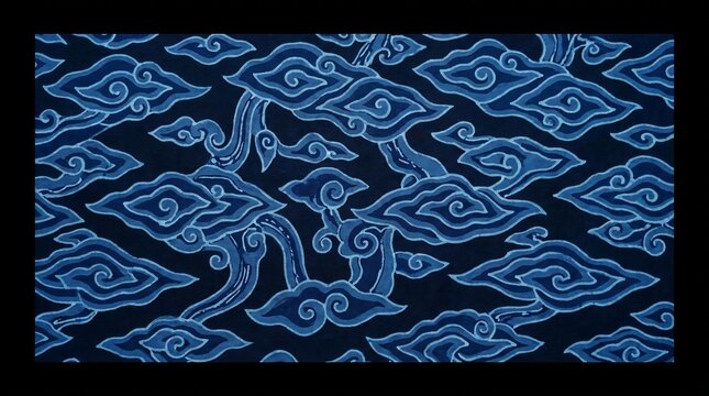 Traditional Indonesian Megamendung Batik Fabric Pattern Featuring Blue Stylized Cloud Shapes for Cultural Textile Background