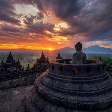 Buddha Statue at Borobudur Temple During Majestic Sunrise in Java, Indonesia