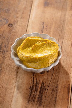 Natural mustard in a jar. Grains of mustard.