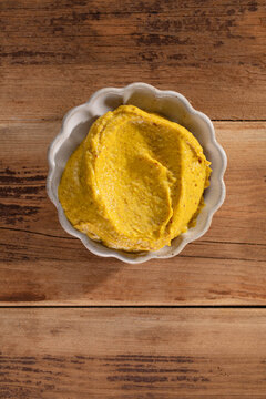 Natural mustard in a jar. Grains of mustard.