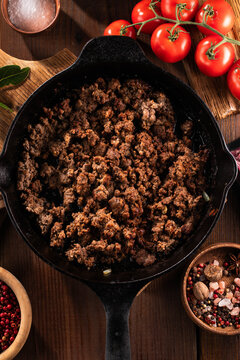 Close up Big Pan with Smoking Hot Ground Beef on Top