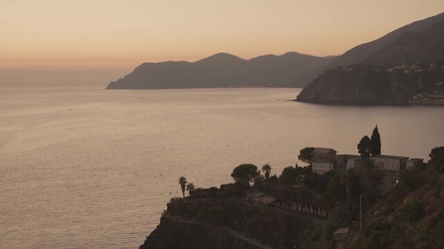 The coastline of Cinque Terra in the evening near Manarola, La Spezia, Italy