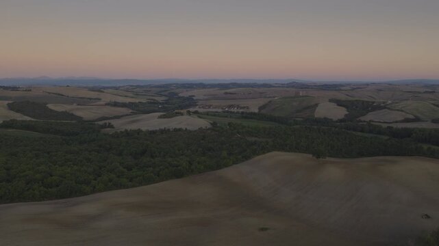 An aerial view of the Tuscan landscape in early morning near Pienza, Italy
