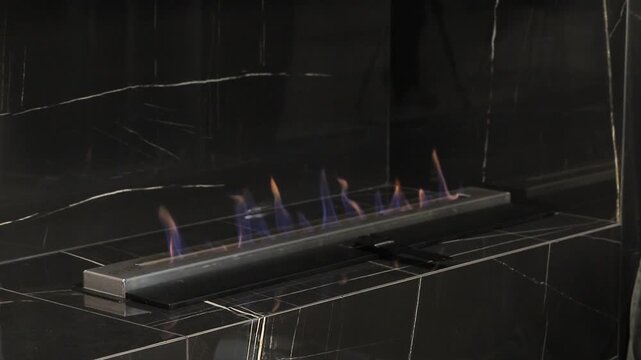 Bioethanol linear fireplace burning blue flames