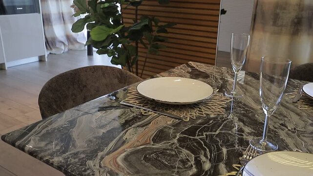 Table setting with white tulips and marble texture