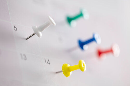 Calendar thumbtack appointment in various dates on calendar diary
