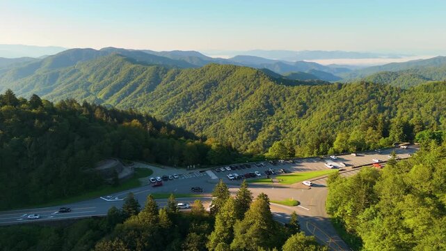 Scenic drive road trip in North Carolina Appalachian mountains. Newfound Gap overlook car parking area for hikers and travelers.