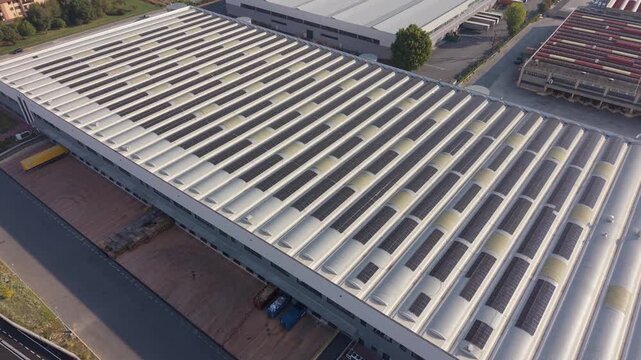 Aerial view of a large logistics warehouse at AKNO Settala 4 Business Park, showing modern distribution infrastructure and industrial facilities in the Lombardy region of northern Italy.