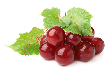 Naklejka premium Fresh ripe grapes and green leaves isolated on white