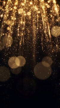 A shimmering vertical cascade of golden light particles and soft bokeh orbs creating an elegant, festive, and magical atmosphere against a deep black background texture.