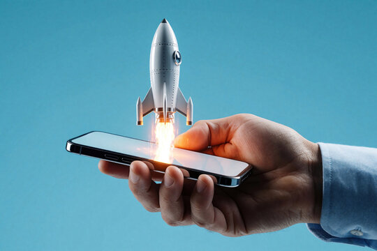 Businessman holds smartphone with white rocket launching from screen. Concept of mobile app startup growth, business success, digital innovation. High tech rocket blast off from phone device
