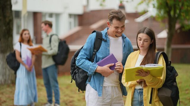 University students discussing homework on campus