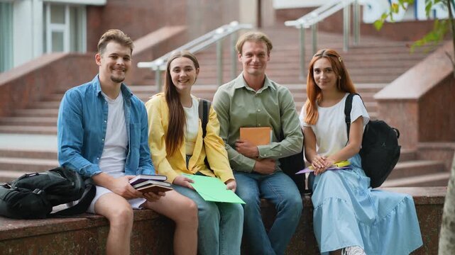 Group of university students smiling together on campus