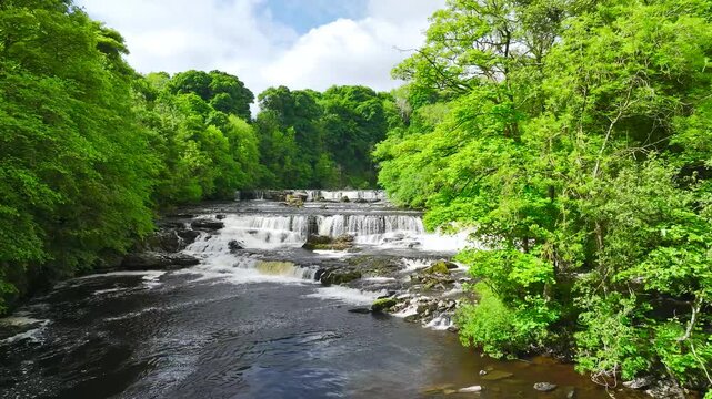 Aysgarth Falls on River Ure from a drone, Yorkshire Dales National Park, North Yorkshire, England, United Kingdom