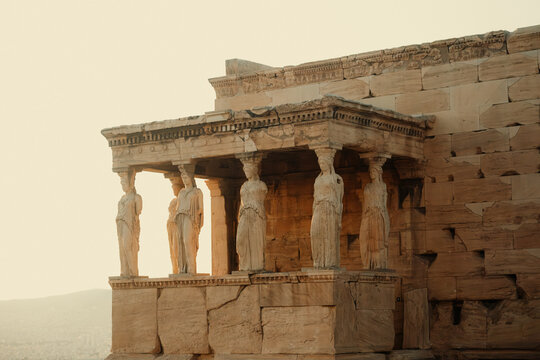 View of the Porch of the Caryatids at the Erechtheion on the Acropolis with its iconic draped female statues supporting the entablature in Athens, Greece.