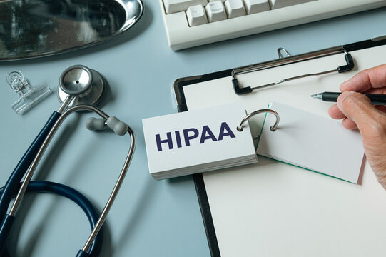 HIPAA Compliance Documentation with Stethoscope and Keyboard &mdash; ideal for healthcare IT security and privacy blog posts