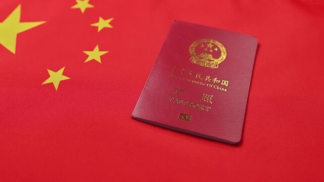 Chinese Passport With National Flag Symbolizing Citizenship And Identity