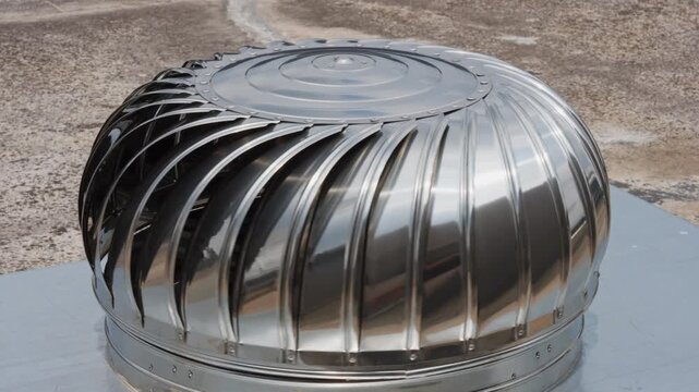 The stainless steel turbine hood on the roof rotates at a constant speed for ventilation