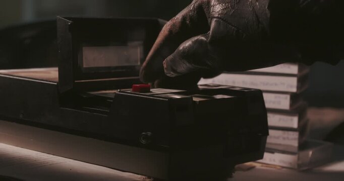 Macro pan reveals a retro cassette recorder with analogue audio tapes on a detective desk, presenting a cinematic true crime evidence archive concept.
