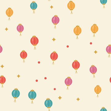 Colorful lanterns and stars on cream background for holidays.