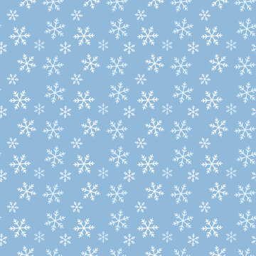 Snowflake patterns blue background winter holiday design.