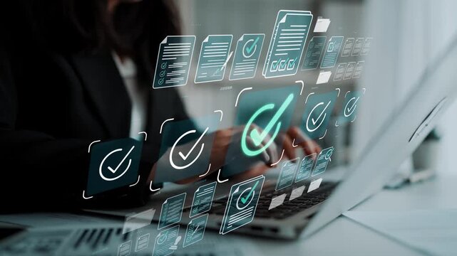 Business professional using laptop with digital checks and document graphics, showcasing productivity and modern technology in office setting Sigmoid